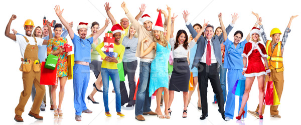 Group of happy Christmas people with gifts. Stock photo © Kurhan