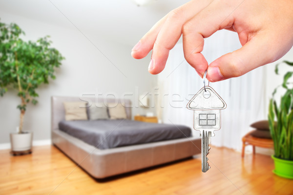 Hand with house key. Stock photo © Kurhan