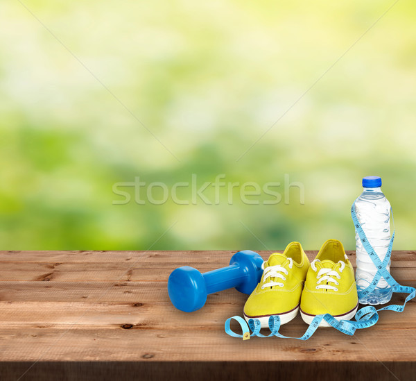 Water and running shoes Stock photo © Kurhan