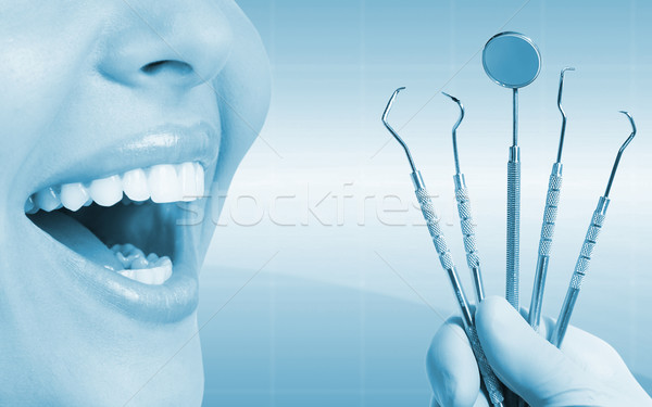 Teeth with dental tools. Stock photo © Kurhan