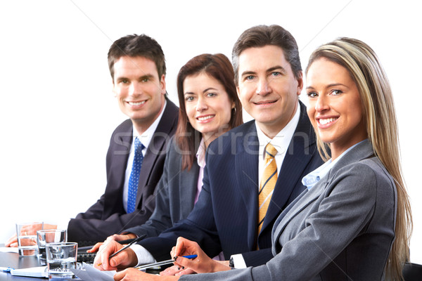 üzletemberek csapat mosolyog dolgozik iroda férfi Stock fotó © Kurhan
