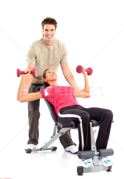 Stockfoto: Gymnasium · fitness · glimlachend · jonge · vrouw · geïsoleerd