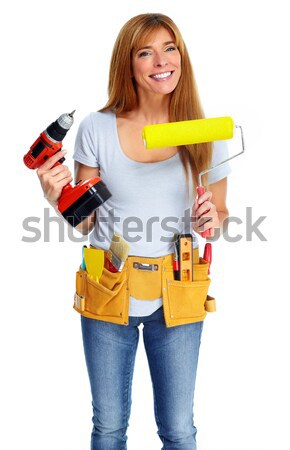 Woman with drill and paint roller. Stock photo © Kurhan