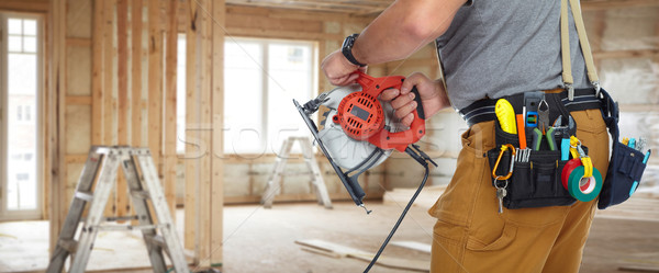 Stockfoto: Handen · bouw · bouwer · elektrische · zag · klusjesman