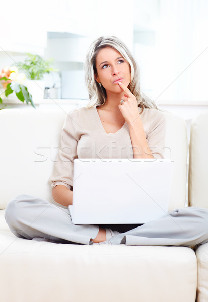 Nő gyönyörű mosolygó nő laptop otthon üzlet Stock fotó © Kurhan