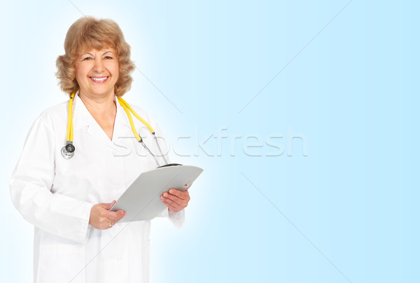 Medic zâmbitor medical femeie stetoscop albastru Imagine de stoc © Kurhan