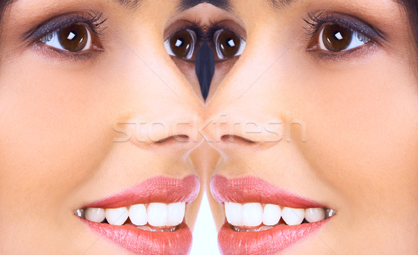 Vrouw gezicht mooie jonge vrouw gezicht reflectie oog Stockfoto © Kurhan