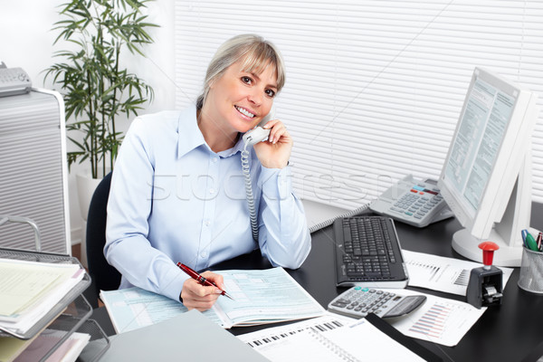 Business woman in the office. Stock photo © Kurhan