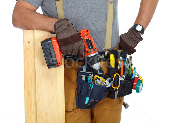 Builder handyman with drill. Stock photo © Kurhan