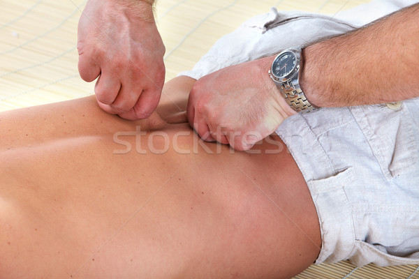 Man having a back massage. Stock photo © Kurhan