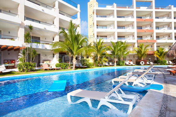 Stock photo: Swimming pool at caribbean resort.