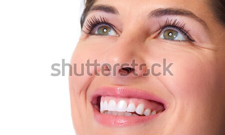 Femeie dinţi frumos lupa sticlă Imagine de stoc © Kurhan