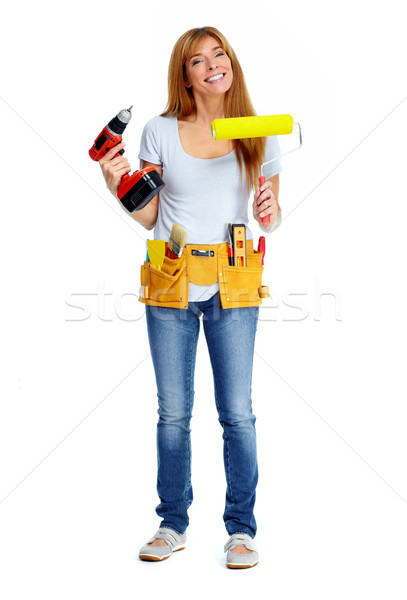 Woman with drill and paint roller. Stock photo © Kurhan
