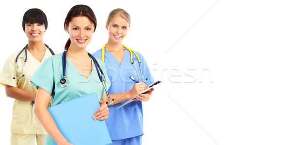 Stock photo: Group of young smiling nurses.