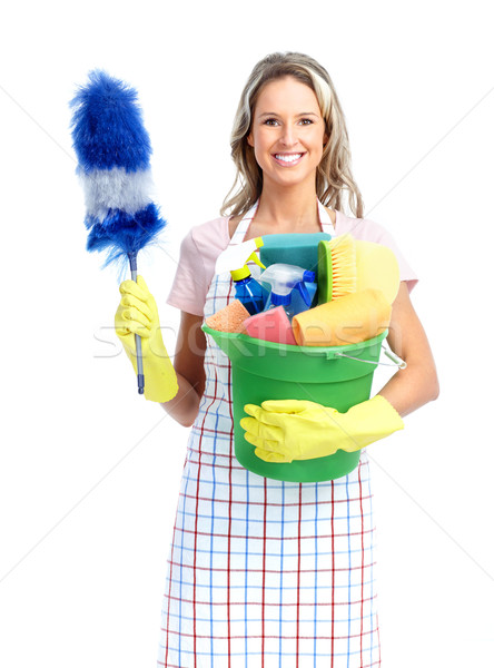 Dona de casa jovem sorridente limpador branco mulher Foto stock © Kurhan
