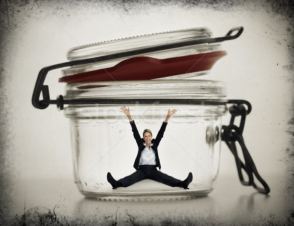 Business woman in jar. Stock photo © Kurhan