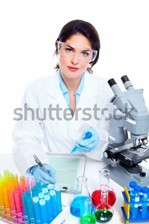 Chinese scientist woman with microscope. Stock photo © Kurhan