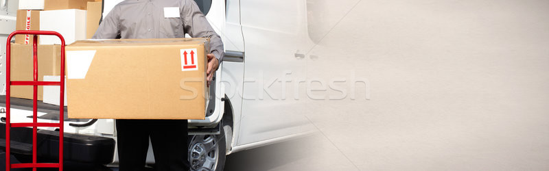 Delivery postman hands with a box Stock photo © Kurhan
