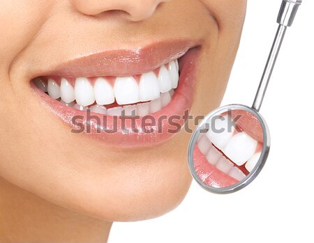 Beautiful woman smile and teeth. Stock photo © Kurhan