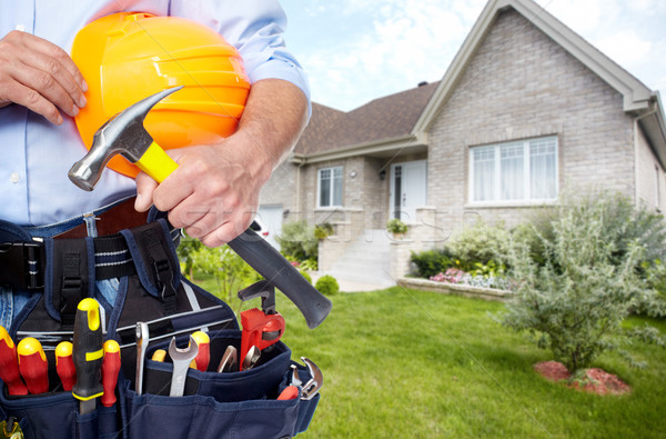 Hands of Handyman with a tool belt.  Stock photo © Kurhan