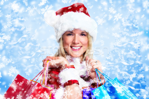 Santa girl with shopping bags. Stock photo © Kurhan