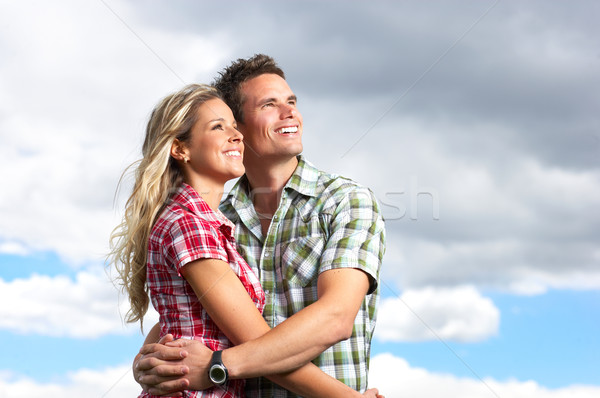 Foto stock: Jovem · amor · casal · céu · nuvens · sorrir