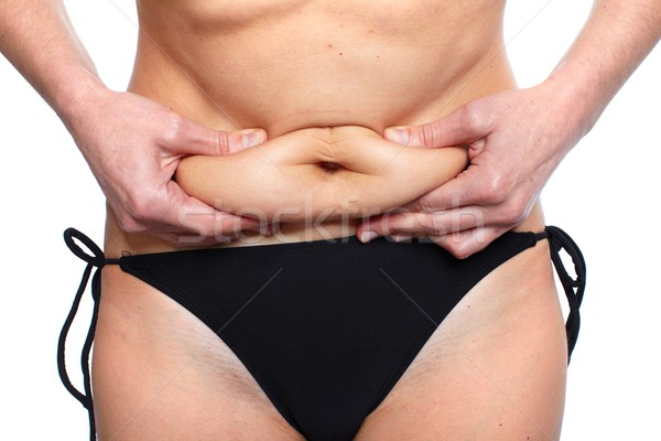Mulher gordura barriga excesso de peso fundo Foto stock © Kurhan