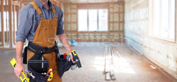 Builder handyman in new house. Stock photo © Kurhan