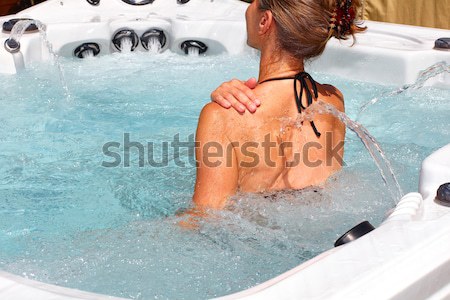 Mooie vrouw ontspannen hot tub jonge water gezondheid Stockfoto © Kurhan