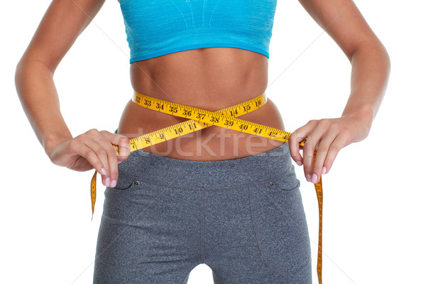 Abdômen mulher jovem barriga perda dieta Foto stock © Kurhan