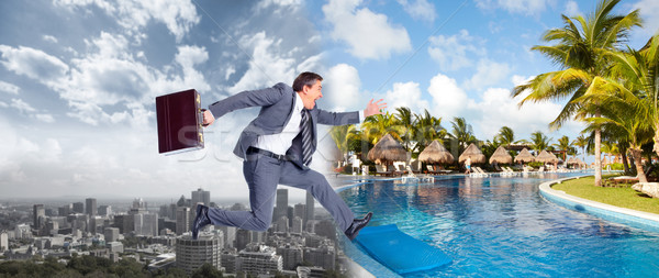 Businessman jumping on the water. Stock photo © Kurhan
