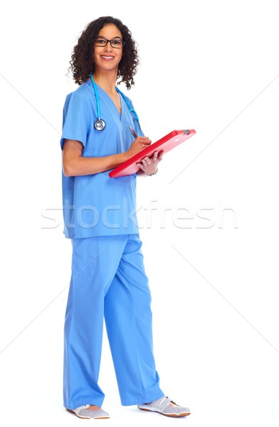 Medical doctor woman writing prescription Stock photo © Kurhan