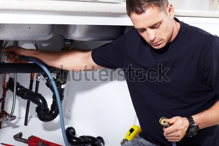 Hand of auto mechanic with wrench. Stock photo © Kurhan