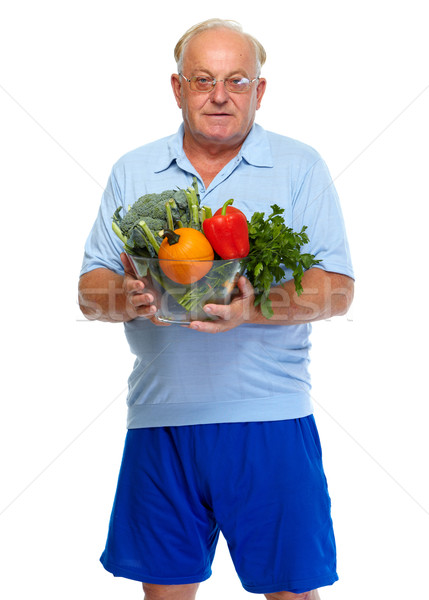 Senior man with vegetables. Stock photo © Kurhan