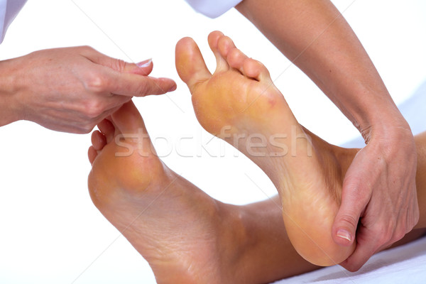 Foot massage. Stock photo © Kurhan