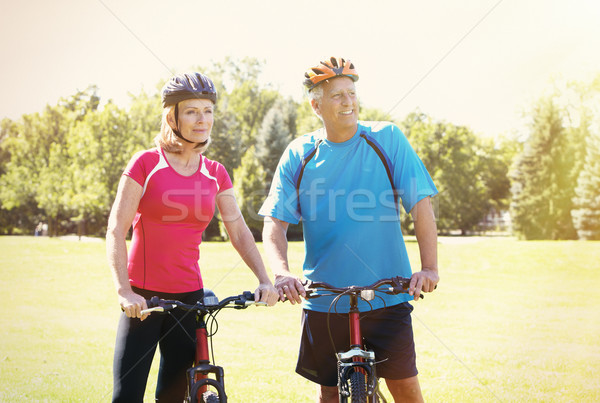 Old people with bycicle Stock photo © Kurhan