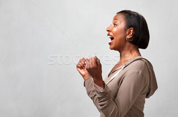 Happy surprised black woman profile Stock photo © Kurhan