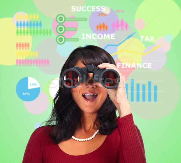 Business woman with binoculars. Stock photo © Kurhan