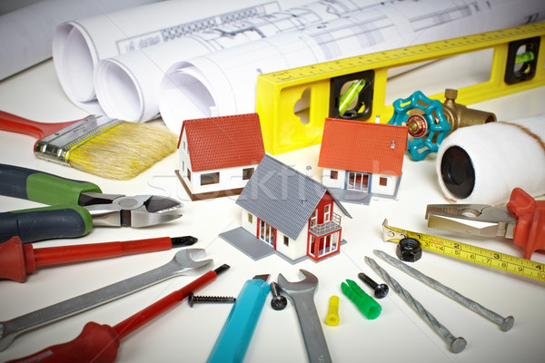 Peu maison construction outils bureau [[stock_photo]] © Kurhan