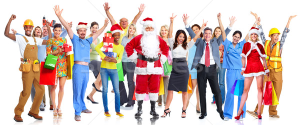 Group of happy Christmas people with gifts. Stock photo © Kurhan