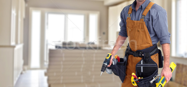 Builder handyman in new house. Stock photo © Kurhan