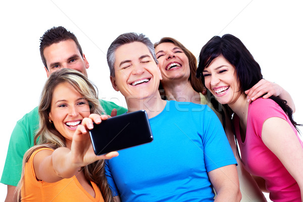 Grupo feliz a la gente tecnología nina cara Foto stock © Kurhan