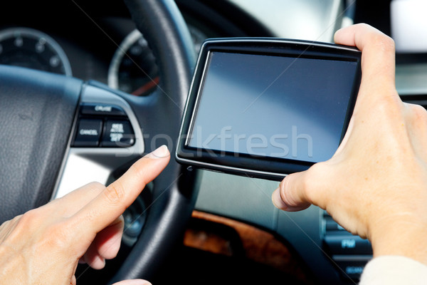 Car driver hands with GPS. Stock photo © Kurhan