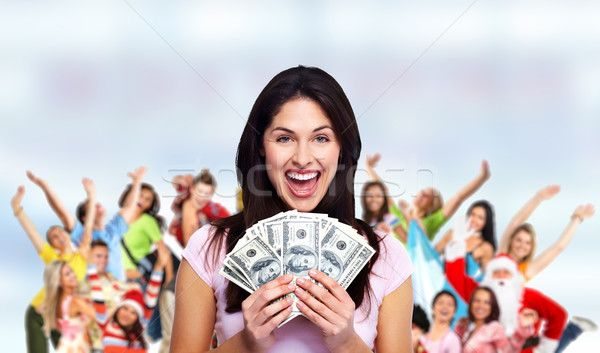 Woman holding money. Stock photo © Kurhan