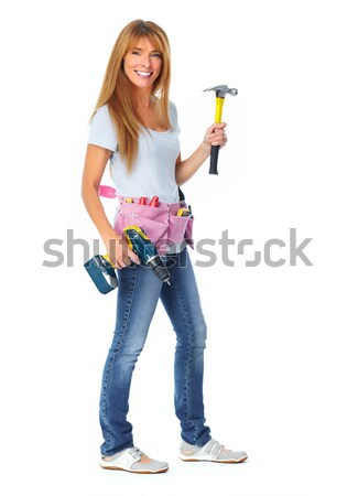 Woman with hammer and drill. Stock photo © Kurhan