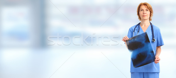 Stock photo: Doctor woman with X-ray photo.