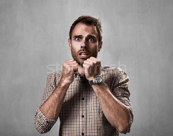 Shocked man face. Stock photo © Kurhan