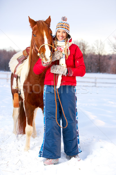 Femme cheval jeunes heureux femme souriante sports d'hiver [[stock_photo]] © Kurhan