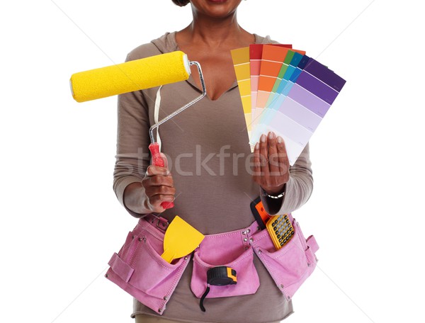 Woman hands with painting roller. Stock photo © Kurhan