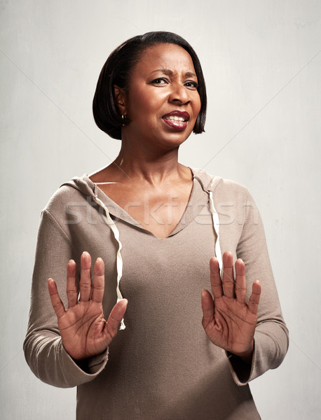 unfriendly black woman Stock photo © Kurhan